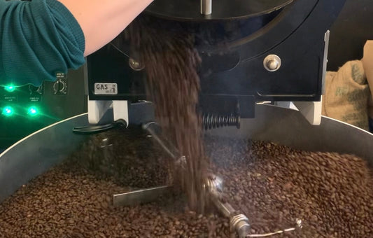 coffee dropping into the cooling tray just as the roast ends