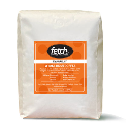 White Kraft paper coffee bag with an orange square label. On the label, the Fetch logo is at the top with a bean next to the 'h'. 
