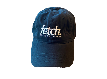 This black canvas hat is unsructured with the fetch logo embroidered on the front with white thread. The back has a metal clasp to adjust to most head sizes. 
